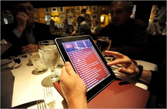 Steakhouse restaurant uses tablets